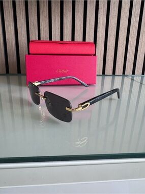 Cartier Black and Gold Rimless Sunglasses with Red Case